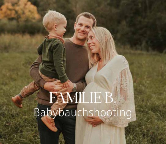 Glückliche Familie bei einem Babybauchshooting in Endingen am Kaiserstuhl